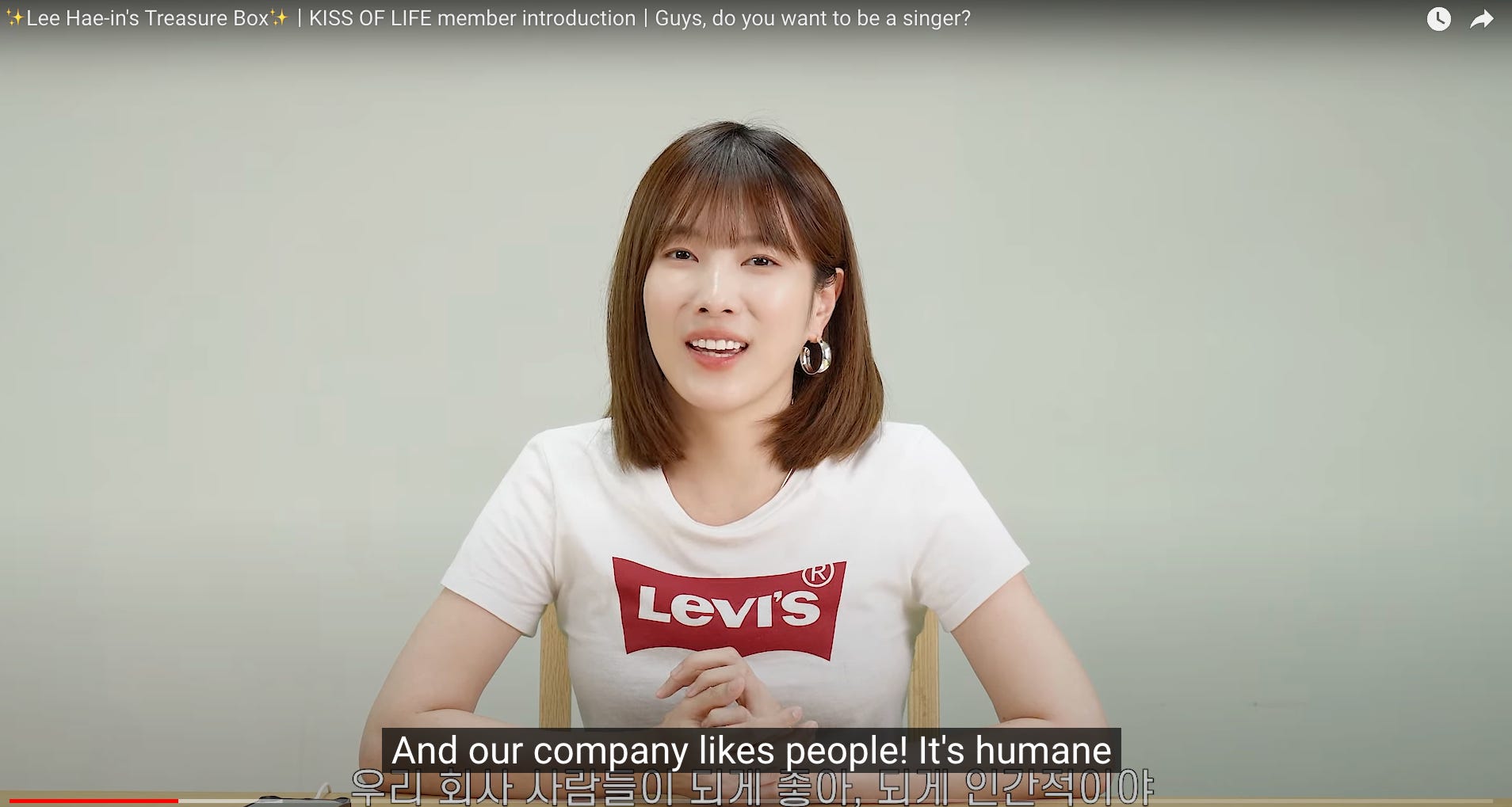 Screenshot of Lee Ha-in smiling, recalling telling Natty "And our company likes people! It's humane" with subtitles in Korean and English