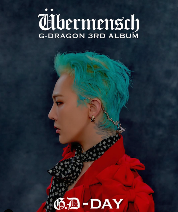 G-Dragon 3rd Album Ubermensch poster, with G-dragon in profile.The bottom says "G.D-Day"