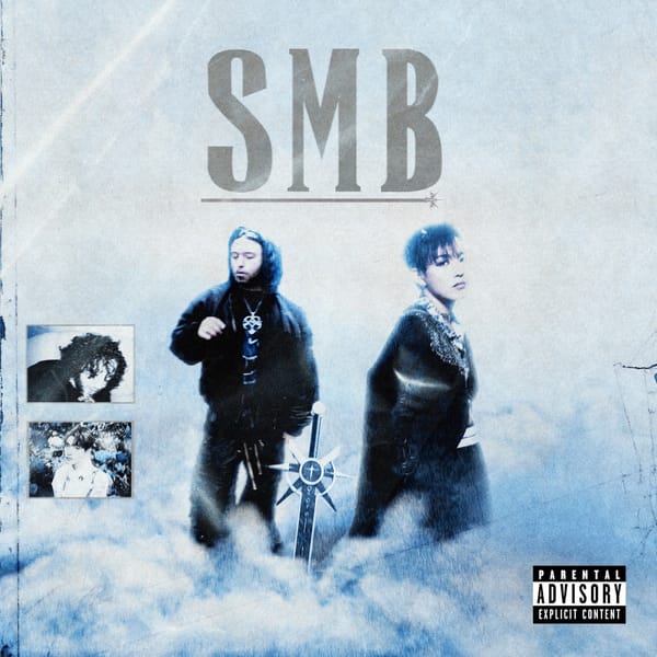 Album cover for "SMB" featuring Odetari and Hongjoong. A "Parental Advisory Explicit Content" sticker is featured.