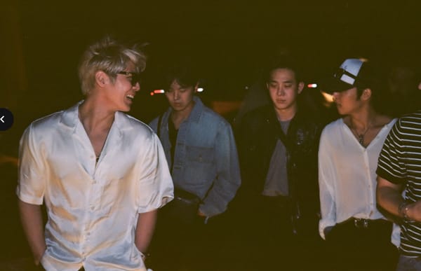 The Rose band members walking through Coachella at night